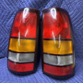 1999-2002 Silverado Sierra Tail Light Set LH RH 16524823 16524516 OEM